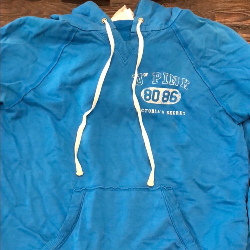 Blue pull over sweat shirt. Loose fitting